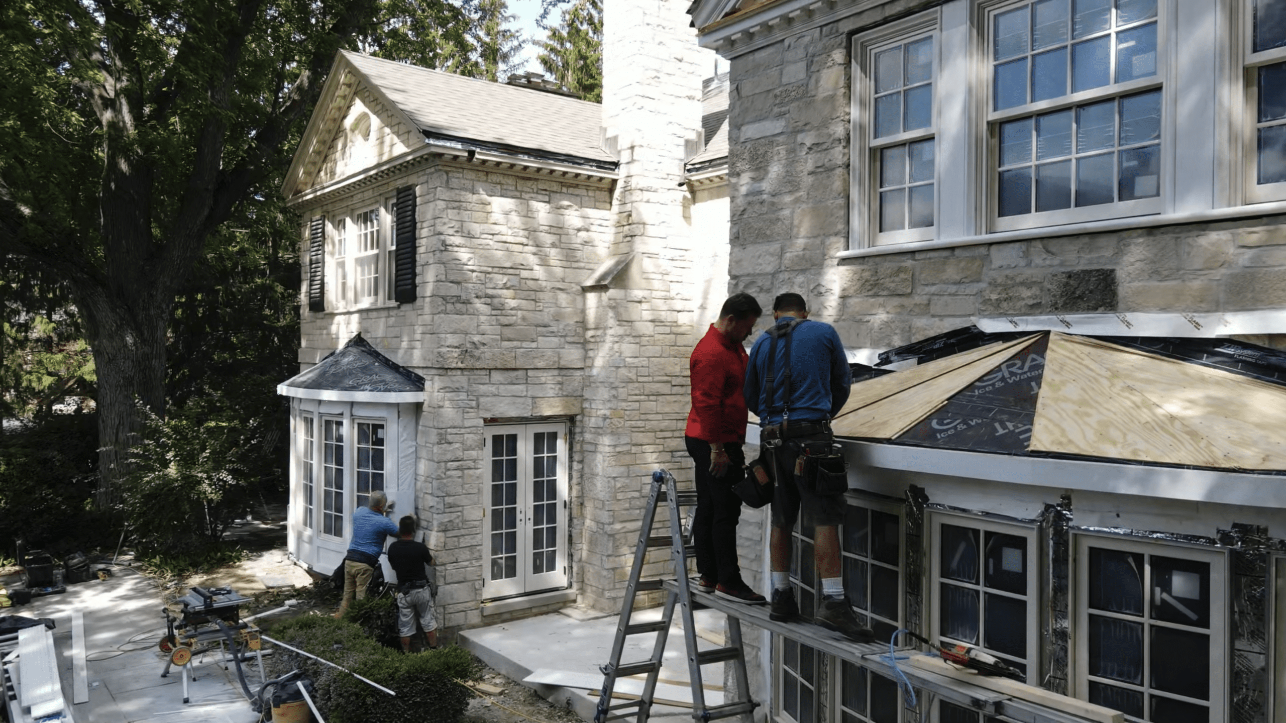 david wilk supervising a roofing installation project in winnetka